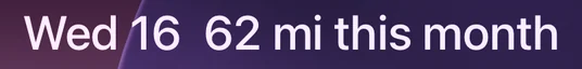 Lock Screen line above the clock: 62 miles this month